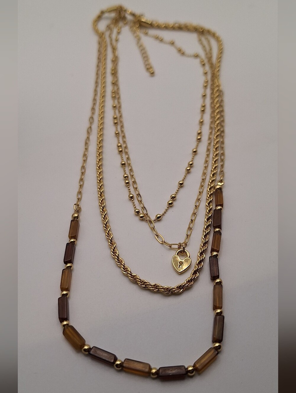 Gold Tone Layered Multi Strand Heart Lock Brown Bead Necklace